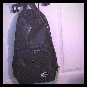 A black glittery backpack